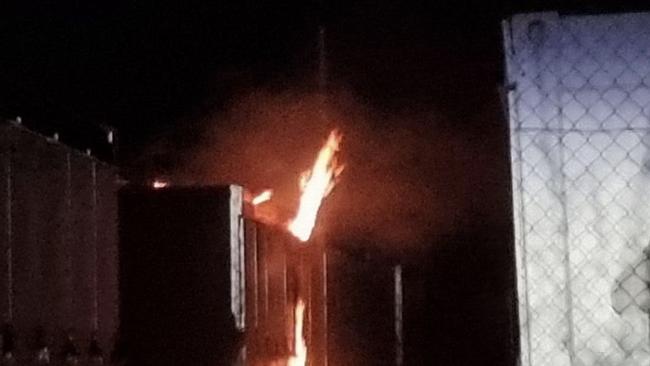 A fire rages in a battery storage bank at a power substation at Bouldercombe near Rockhampton. Pic: Kentos Komms