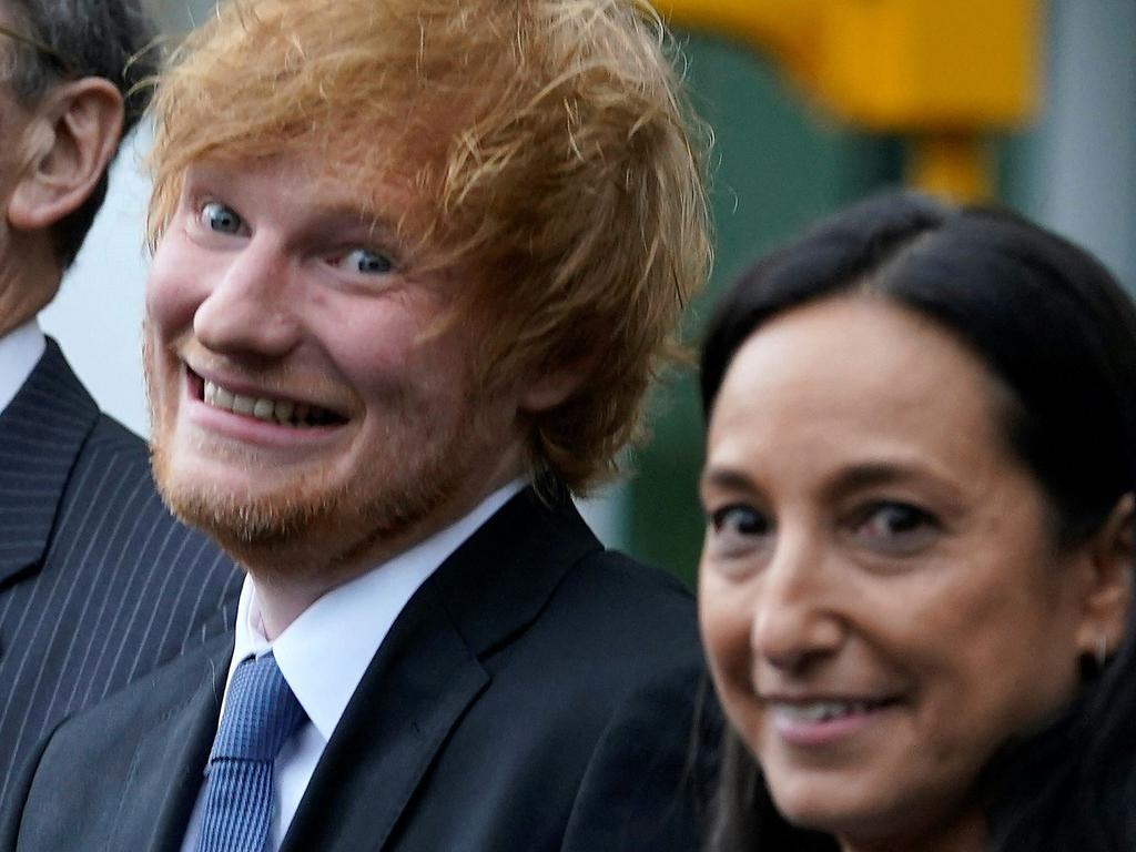 Ed Sheeran hugged his lawyers after winning the “bogus” copyright claim. Picture: AFP