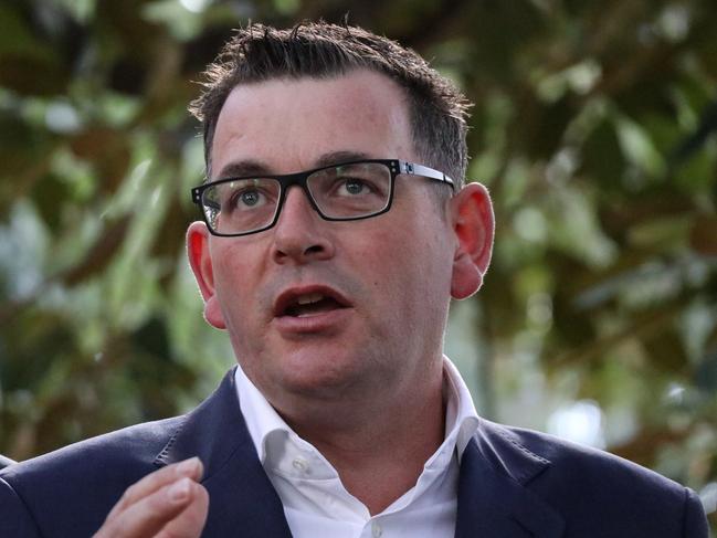 Victorian Premier Daniel Andrews speaks to the media following the release of Victorian Ombudsman Deborah Green's report into the Victorian government's 2014 election campaign in Treasury Gardens in Melbourne, Wednesday, March 21, 2018. Victoria's Labor government is sorry for a $388,000 election campaign rort and has repaid the money, but Premier Daniel Andrews won't step down over the scandal embroiling several of his senior ministers. The state ombudsman on Wednesday published a damning report naming 21 Labor MPs, past and present, found to have breached parliamentary guidelines during the party's victorious 2014 election campaign. (AAP Image/Alex Murray) NO ARCHIVING