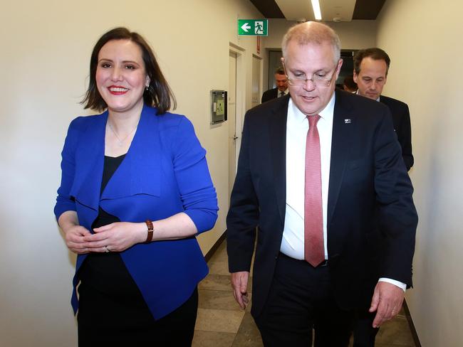 Scott Morrison, pictured with former Revenue and Financial Service Minister Kelly O'Dwyer, whose position is likely to be changed, will be having conversations with colleagues over the weekend as he reshapes the cabinet. Picture: AAP