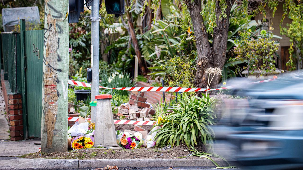 Tributes are left at the Burwood intersection near Highbury Rd where 28-year-old Ashburton man William Taylor was killed in a horror crash. Picture: Mark Stewart