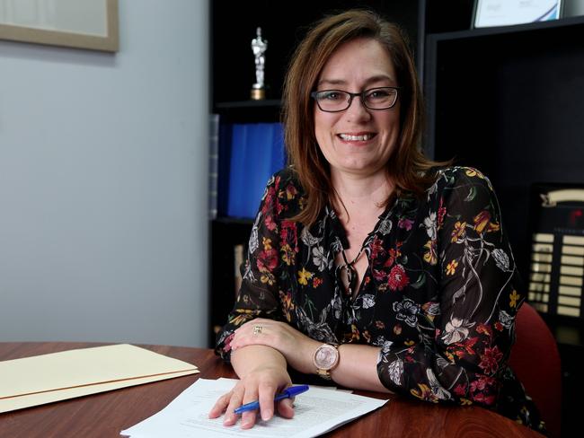 Recruiter Rebecca Bolton from Precruitment looking through resumes. PICTURE: STEWART McLEAN