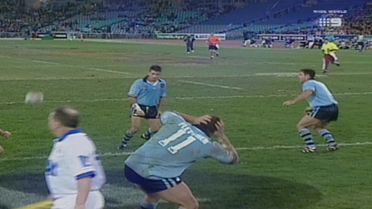 Bryan Fletcher at the centre of the famous ‘grenade’ try celebration for NSW.