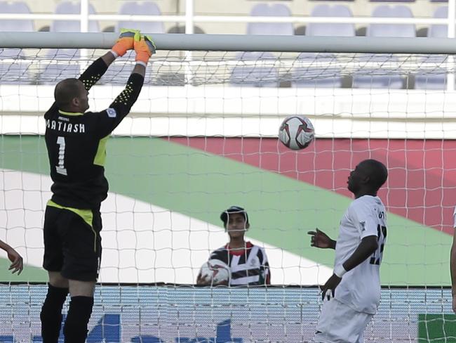 Kyrgyz Republic's goalkeeper Pavel Matiash, third left, concedes a goal during the AFC Asian Cup group C soccer match between China and Kyrgyzstan at the Khalifa bin Zayed Stadium in Al Ain, United Arab Emirates, Monday, Jan. 7, 2019. (AP Photo/Nariman El-Mofty)