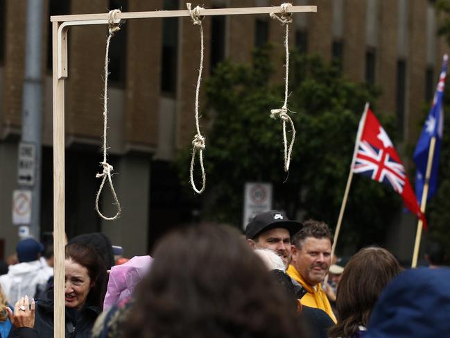 A gallows with nooses is seen during a rally against the state government's proposed pandemic laws, in Melbourne. Picture: NCA NewsWire / Daniel Pockett