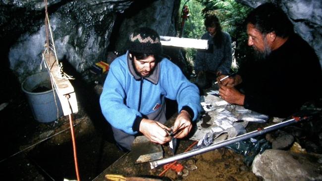 Excavation of small pit at Bone Cave under Jim Allen's permits. This material from this cave together with all other Tasmanian archaeological material was returned to Tasmania in 1996. Picture: Rudy Frank