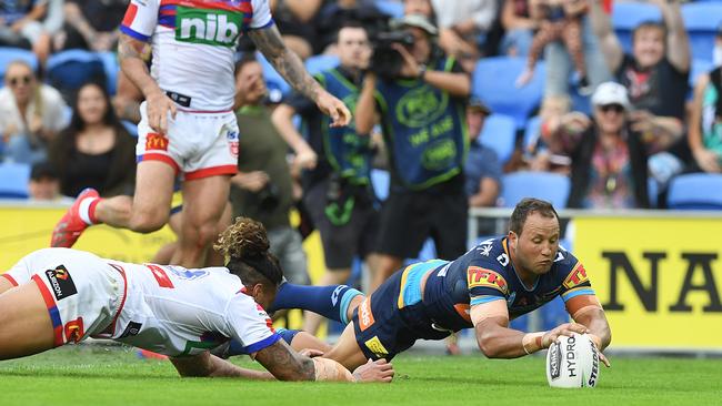 Tyrone Roberts gets his hands to the ball to score the try. Picture: AAP Image/Dave Hunt