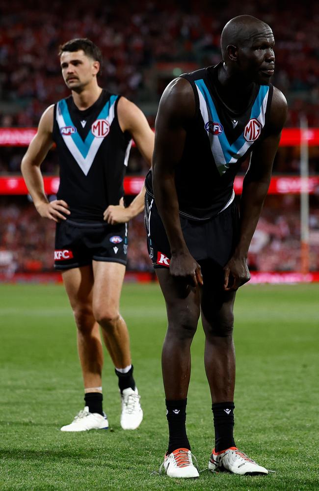 Aliir Aliir and Ryan Burton after the loss. Picture: Michael Willson/AFL Photos