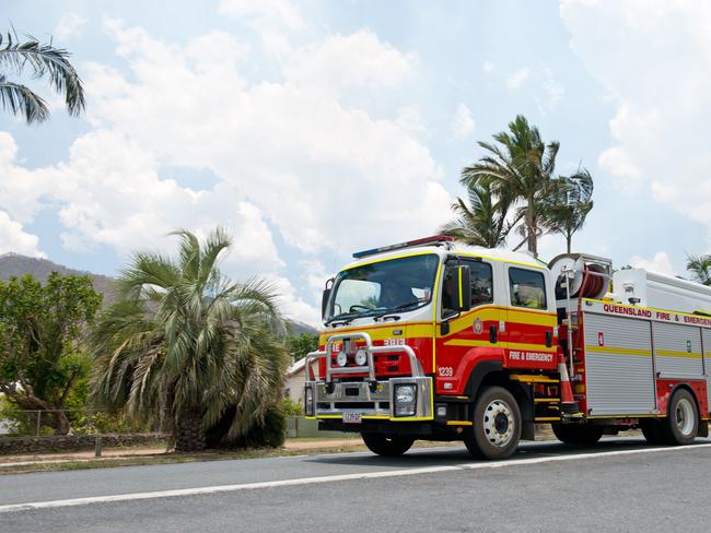 A fire truck returns to Finch Hatton to refill with water. QFES generic