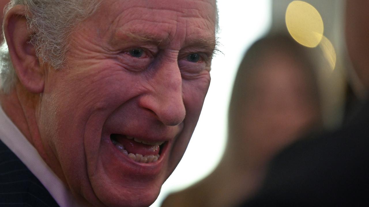 King Charles III talks with volunteers and beneficiaries of local community initiatives in King's Cross, during a visit to King's House, a community hub founded by King's Cross Church (KXC), on December 8, 2022 in London, England. (Photo by Justin Tallis – WPA Pool/Getty Images)