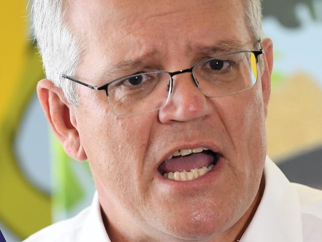 BRISBANE, AUSTRALIA - NewsWire Photos - DECEMBER 21, 2021. Australian Prime Minister Scott Morrison speaks at a press conference at the the Bribie Island Surf Life Saving Club, north of Brisbane. Picture: NCA NewsWire / Dan Peled