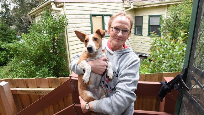 Ms Leszko on her back veranda with her beloved Bella. Picture: Lawrence Pinder