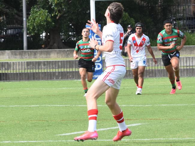 Aaron Carroll gets under the ball. Picture: Sean Teuma