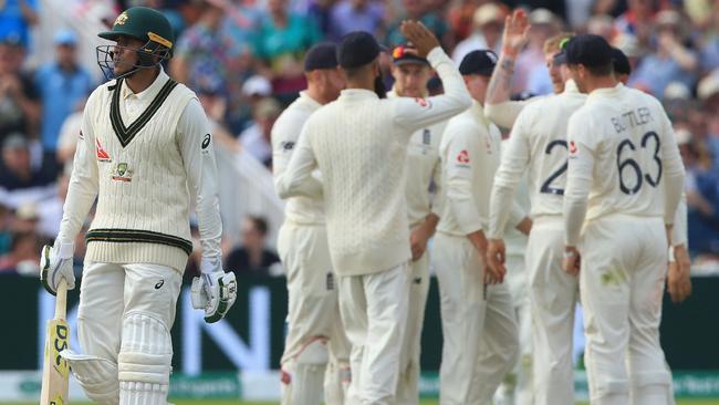 Usman Khawaja walks back to the pavilion after losing his wicket in the second innings. Picture: AFP