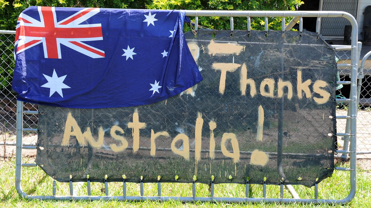 A thank you message is written in mud on a trampoline in the flood affected suburb of Goodna, south west of Brisbane, Tuesday, Jan. 18, 2011.