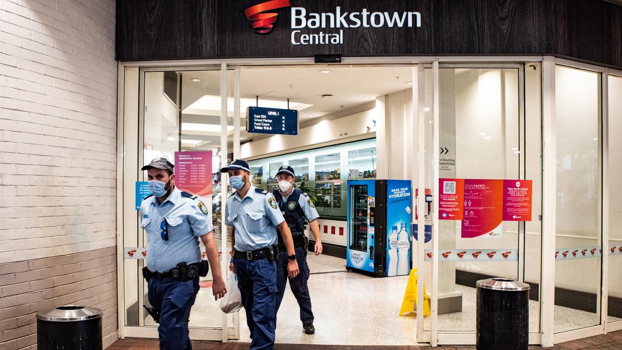 Police at Bankstown shopping centre where locals complained they now lived in a ‘North Korean style police state’. Picture: NCA NewsWire/ Flavio Brancaleone