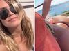 Heidi Klum strips down in bare-bum vid
