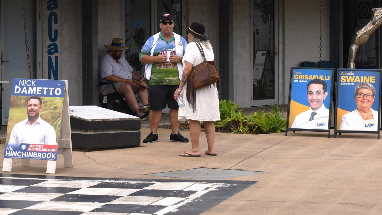 Hinchinbrook MP Nick Dametto campaign volunteer Jason Valastro wooing voters at the at the early-voting centre in Ingham. Picture: Cameron Bates