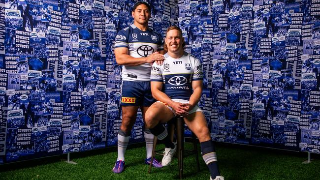 Jason Taumalolo and Reuben Cotter in the 2025 home and away jerseys.