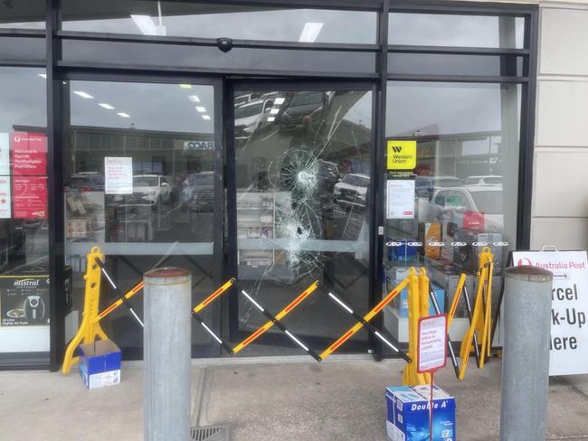 The glass front doors of Red Hill Rockhampton Post Shop were smashed on July 4.