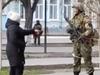 Furious woman confronts Russian soldier