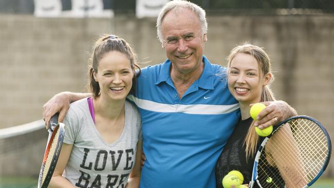 Sitting Bennelong MP John Alexander with his daughters, Georgia and Emily, at the Ryde Tennis Centre on the weekend. AAP IMAGE/ Tim Pascoe