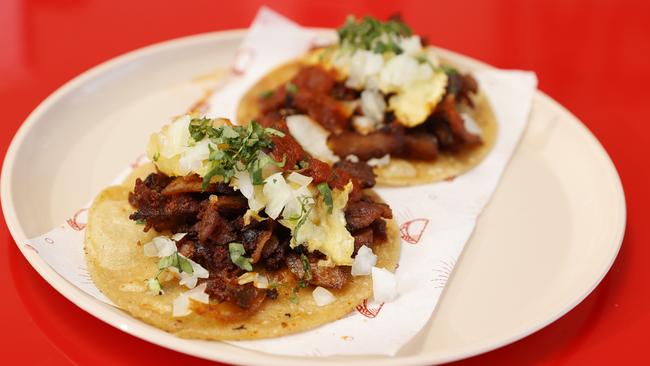 The Al Pastor taco with flame-grilled pork adobo, salsa rosa and pineapple. Picture: Lachie Millard