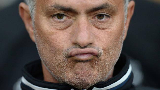 Manchester United's Portuguese manager Jose Mourinho waits for kick off of the friendly Wayne Rooney testimonial football match between Manchester United and Everton at Old Trafford in Manchester, northwest England, on August 3, 2016. / AFP PHOTO / OLI SCARFF