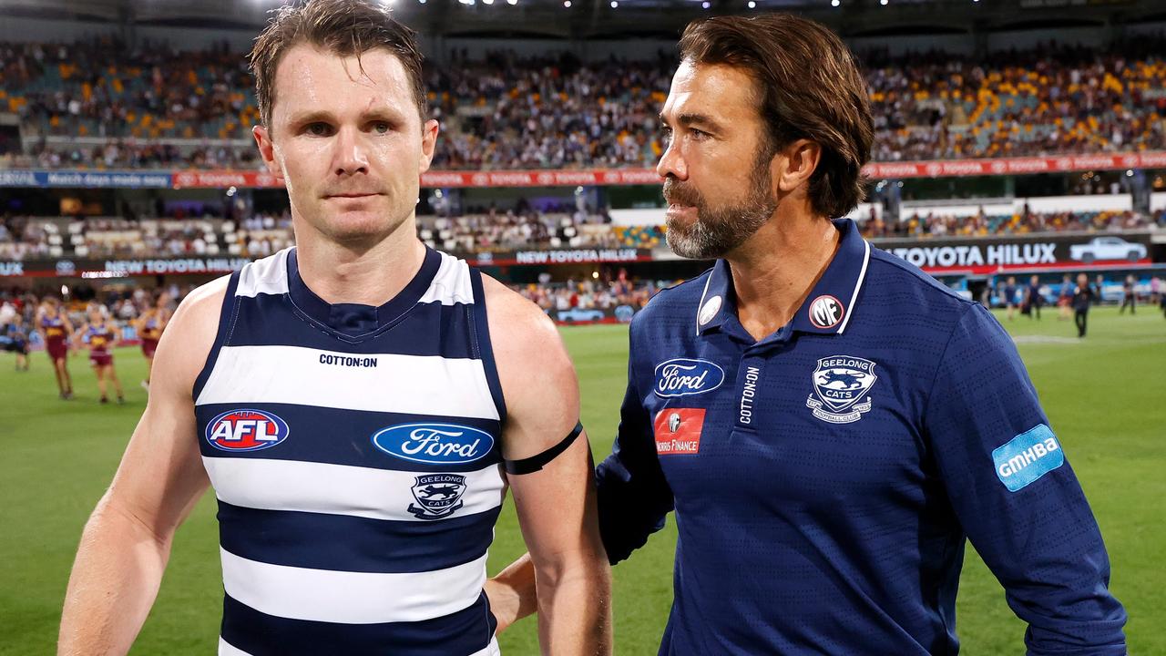 BRISBANE, AUSTRALIA - OCTOBER 17: Patrick Dangerfield (left) and Chris Scott, Senior Coach of the Cats celebrate during the 2020 AFL Second Preliminary Final match between the Brisbane Lions and the Geelong Cats at The Gabba on October 17, 2020 in Brisbane, Australia. (Photo by Michael Willson/AFL Photos via Getty Images)