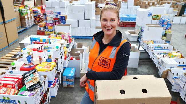 Melburnian Emma, 31, has been volunteering for Foodbank after recently losing her job and has now been employed as a supervisor. Picture: Aaron Francis