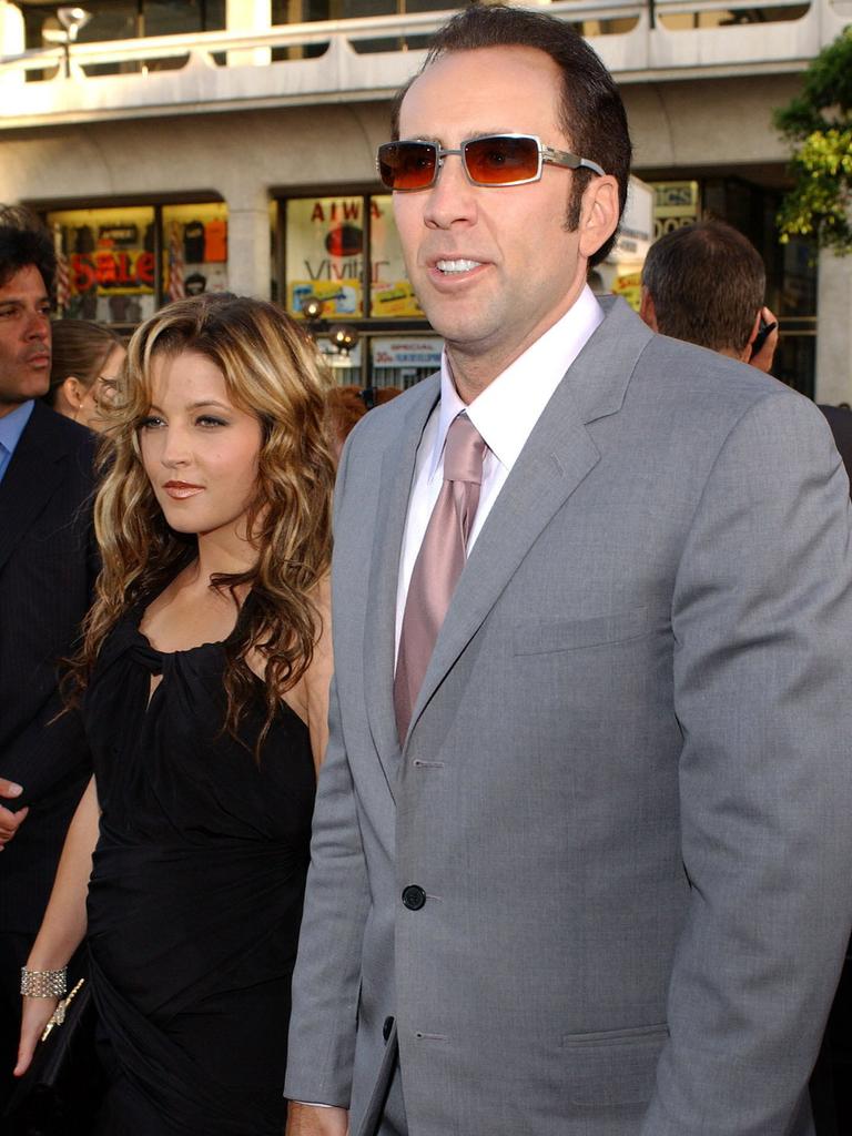 Actor Nicholas Cage and girlfriend Lisa Marie Presley at the premiere of new film "Windtalkers," in Los Angeles, California.