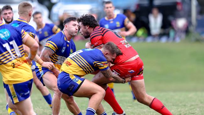 Matt Crocker charging into the Giants’ defence. Picture: DC Sports Photography