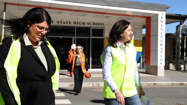 Education minister Grace Grace and Premier Annastacia Palaszczuk tour the Indooroopilly State High School multipurpose shelter construction site. Education Qld has proposed building a new primary school at Indooroopilly State High, but has investigated other options. Picture: Liam Kidston