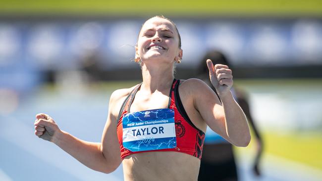 Gabriella Taylor from UTS Norths reacts after seeing she got a qualifying time