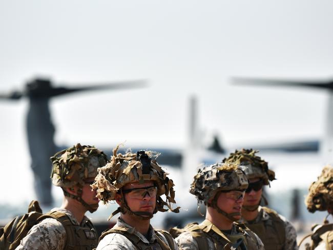 Marines with Marine Rotational Force Darwin 18 prepare to board an MV-22 Osprey tilt-rotor aircraft at Royal Australian Air Force Base Darwin July 24, 2018. The Marines were heading to Mount Bundy to take part in field training. PHOTO: U.S. Marine Corps Staff Sgt Daniel Wetzel