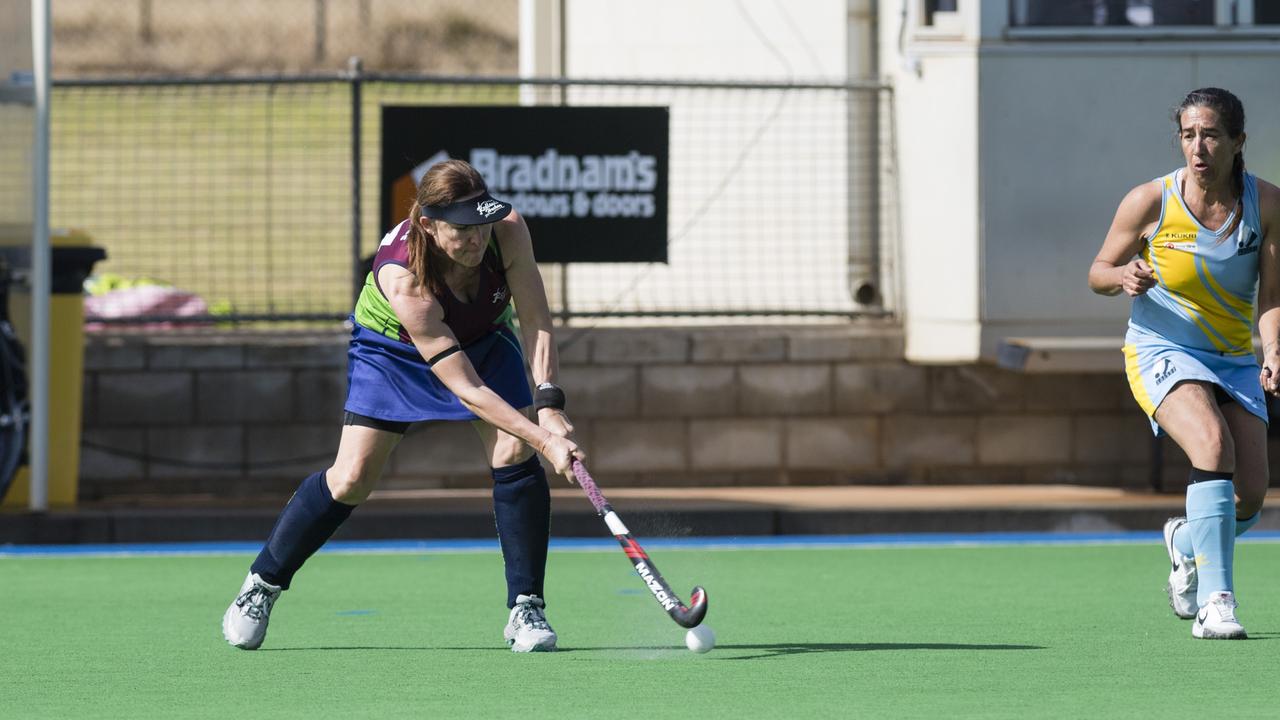 Roxann Webb (left) of Redlands 1 against Cairns 1.