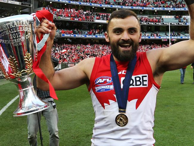 AFL Grand Final - Sydney Swans v Hawthorn at the MCG. 'Kenny and Rhyce Shaw with the cup.