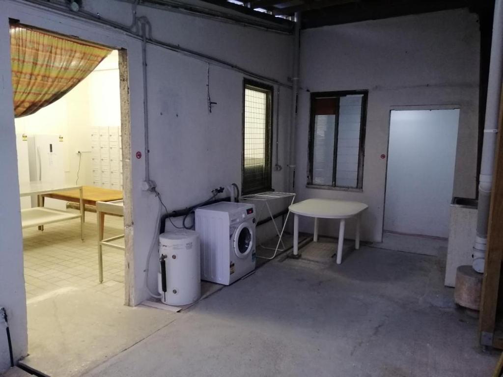 Laundry area of the boarding house at Flinders St. Picture: Booking.com.