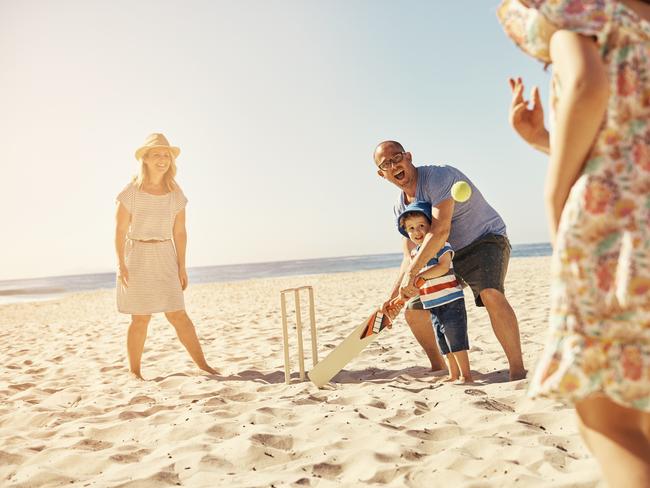 Shot of a happy family playing cricket on the beachhttp://195.154.178.81/DATA/i_collage/pu/shoots/806441.jpg i stock image