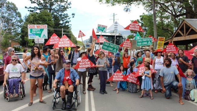 Water mining protesters blocked two trucks in Uki on Saturday which they believed were carting water illegally.