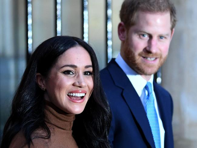 LONDON, UNITED KINGDOM - JANUARY 07: Prince Harry, Duke of Sussex and Meghan, Duchess of Sussex react after their visit to Canada House in thanks for the warm Canadian hospitality and support they received during their recent stay in Canada, on January 7, 2020 in London, England. (Photo by DANIEL LEAL-OLIVAS  - WPA Pool/Getty Images)