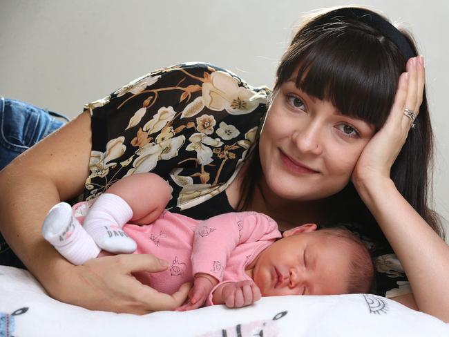 Elise Phillips with her newborn Naiah.  She opted to have her baby at home with no medical professional as she was afraid of coronavirus risks at hospital. Pics Adam Head