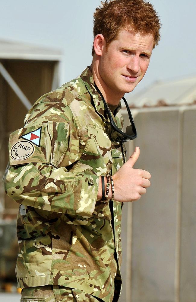 Prince Harry gives the thumbs up upon his arrival at Camp Bastion in Afghanistan, on September 7, 2012.