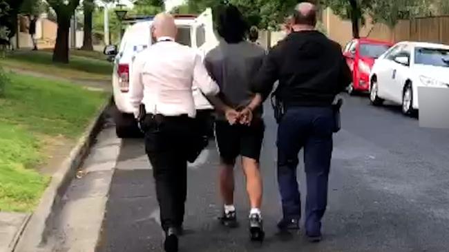 Police arrest a 21-year-old Brunswick West man after the anti-lockdown rally.