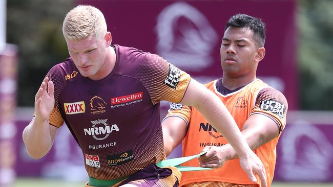 Thomas Flegler (left). The Brisbane Broncos training at Red Hill. Pic Peter Wallis