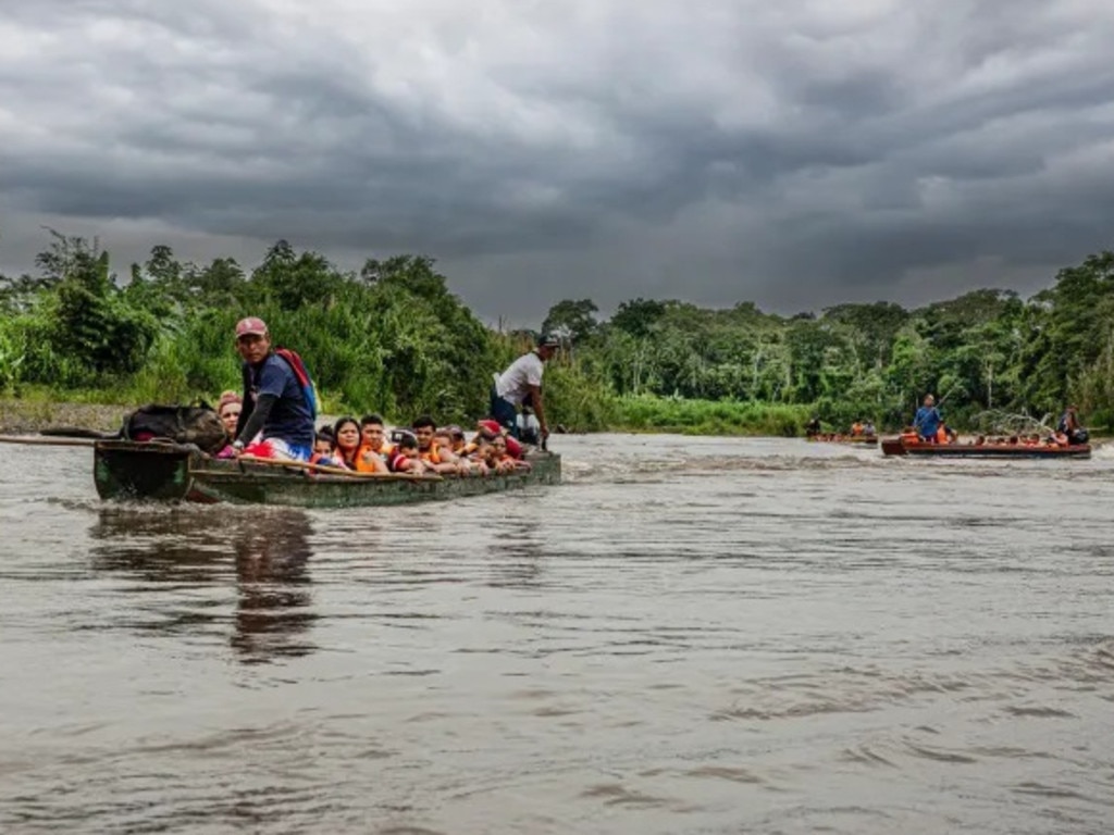 Migrants arrive across the Tuquesa River at the Lajas Blancas Migrant Reception Station, a camp set up by the Panamanian government. Picture: Juan Carlos Tomasi/MSF