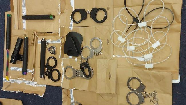 Items allegedly seized in a raid on a prison officer’s home. Picture: NSW Police