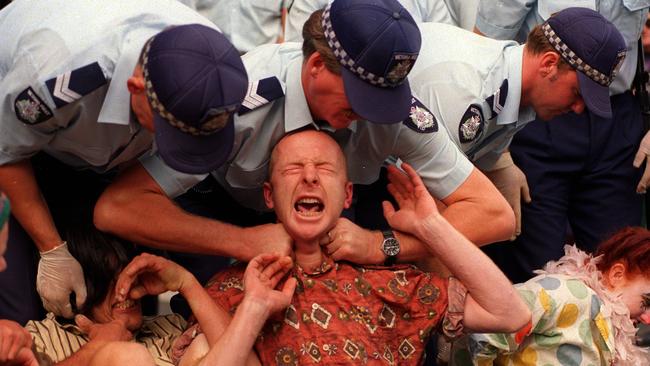 The practice of police using ‘pressure point’ tactics on members of the public was banned as a result of this powerful photo by Peter Ward, capturing the method being used on a demonstrator at an East Melbourne anti-logging protest in 1994.