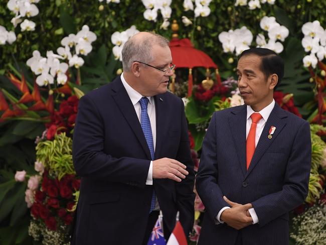 Australian Prime Minister Scott Morrison and Indonesian President Joko Widodo, pictured at their first meeting, are likely to discuss the deal today when they meet in Singapore on the sidelines of ASEAN. Picture: AAP