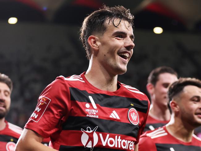 SYDNEY, AUSTRALIA - NOVEMBER 08:  Nicolas Milanovic of the Wanderers celebrates with team mates after scoring his third goal during the round four A-League Men match between Western Sydney Wanderers and Newcastle Jets at CommBank Stadium, on November 08, 2024, in Sydney, Australia. (Photo by Matt King/Getty Images)